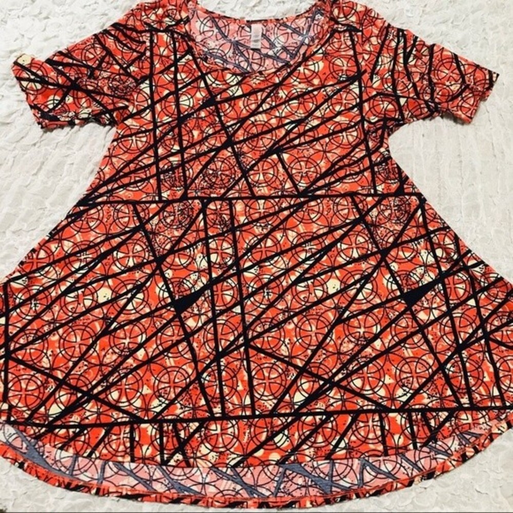 LuLaRoe Orange top  Geometric print short sleeves long top size S
